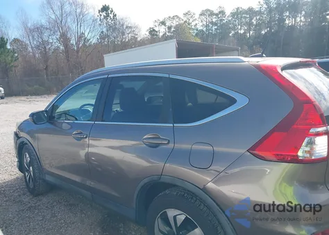 2016 Honda Cr-V Touring z USA, uszkodzony, nr VIN 5J6RM3H97GL004260
